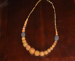 Tan felt beads with lava rock and beads