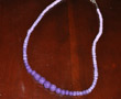Long strand of purple ombre beads